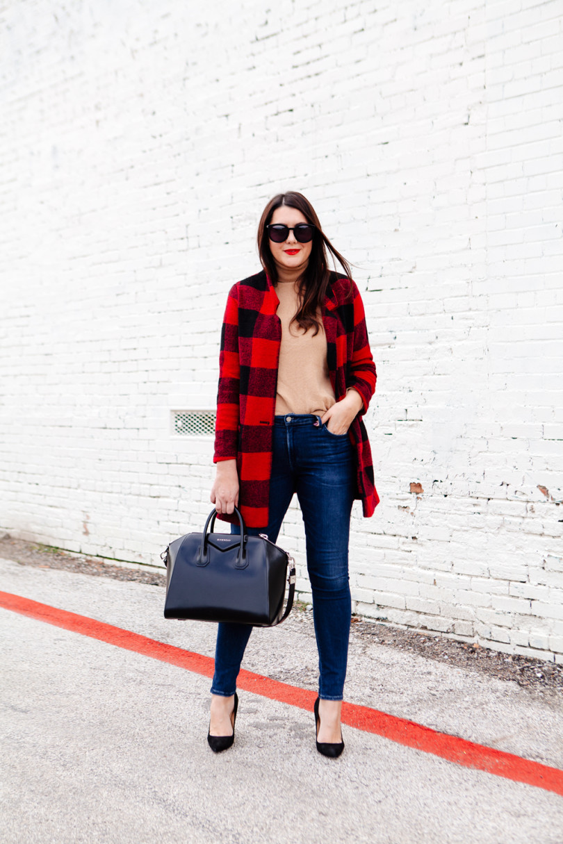 Buffalo plaid jacket with camel sweater and black heels on Kendi Everyday.