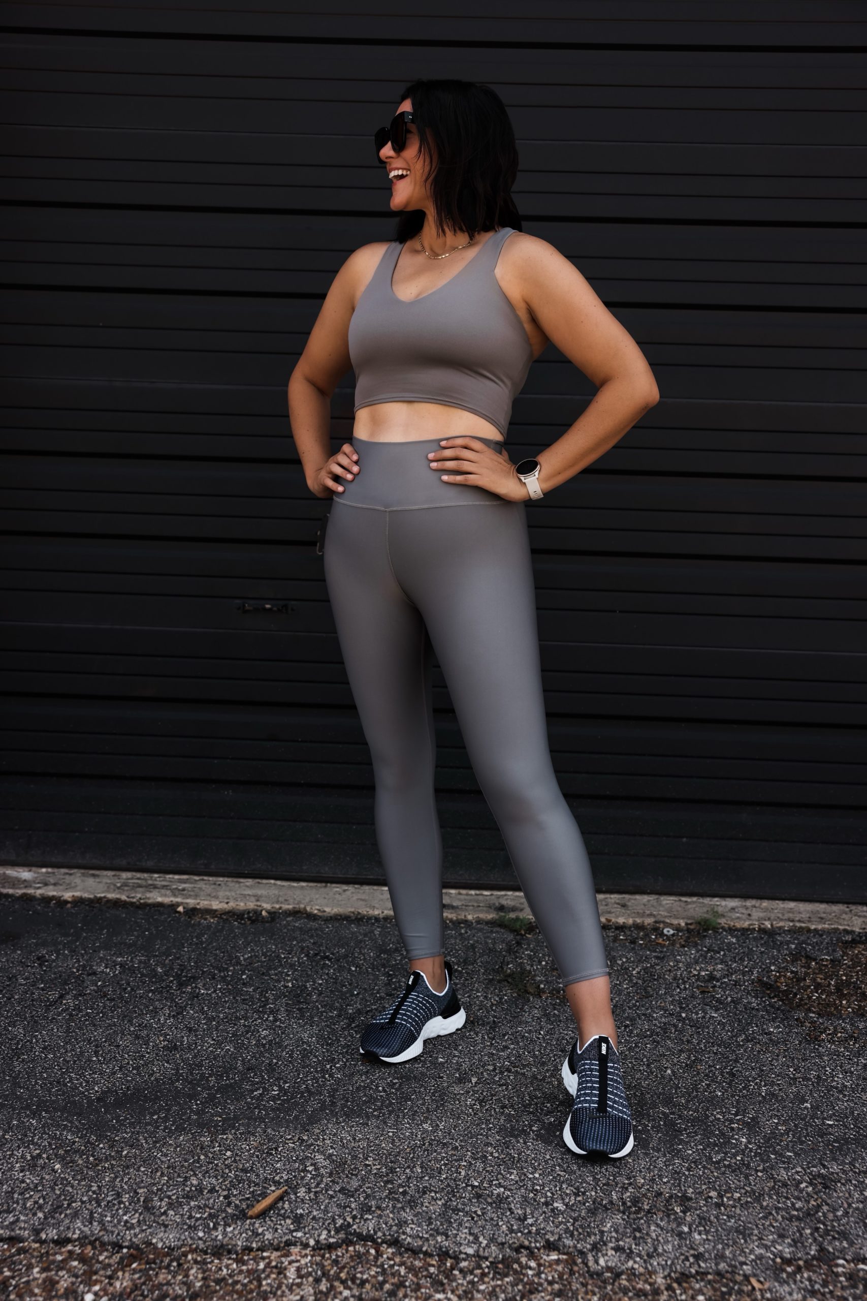 https://www.kendieveryday.com/wp-content/uploads/2021/07/Kendi-Everyday-wearing-Alo-Airlift-Leggings-outfit-03-scaled.jpg