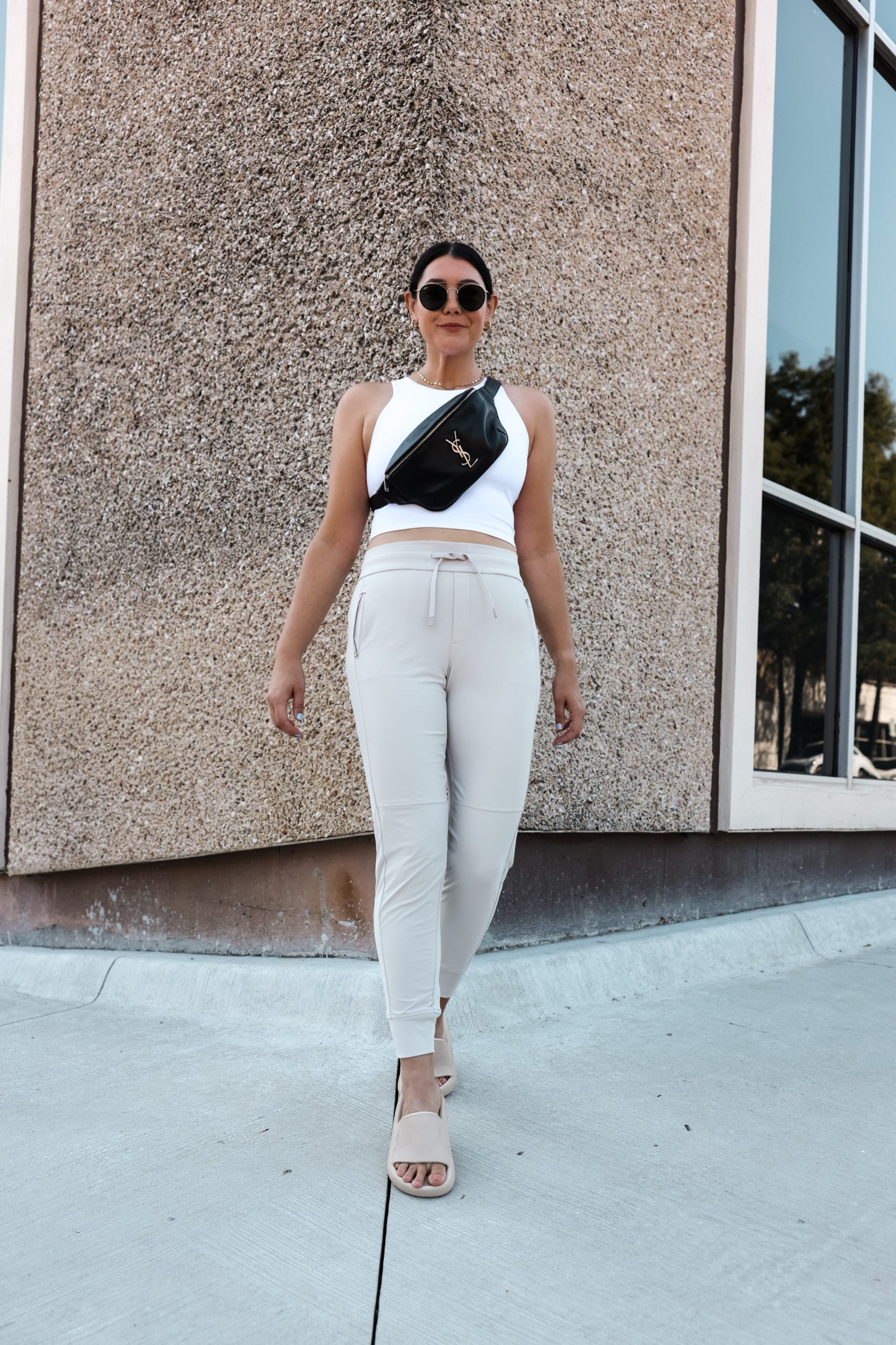 Kendi Everydway wearing Athleta Highland Hyrbid Joggers and Conscious Crop  with YSL Belt Bag 01